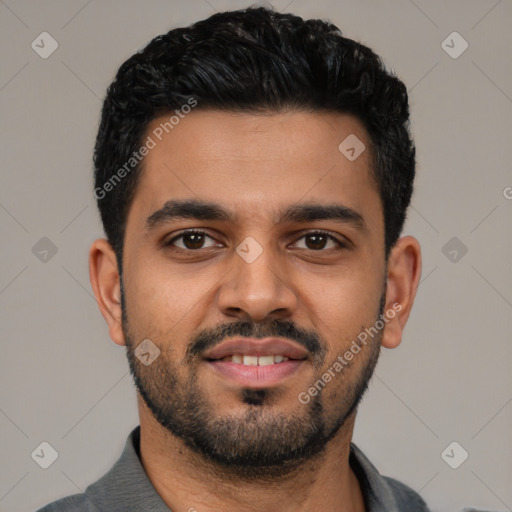 Joyful latino young-adult male with short  black hair and brown eyes