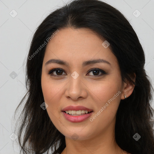 Joyful latino young-adult female with long  brown hair and brown eyes