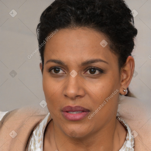 Joyful latino young-adult female with short  brown hair and brown eyes