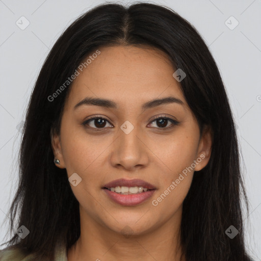 Joyful latino young-adult female with long  brown hair and brown eyes