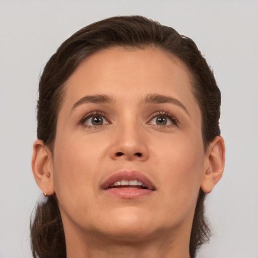 Neutral white young-adult female with short  brown hair and brown eyes