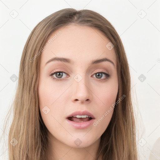 Neutral white young-adult female with long  brown hair and brown eyes