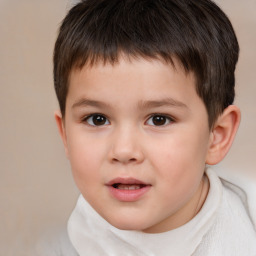 Joyful white child male with short  brown hair and brown eyes