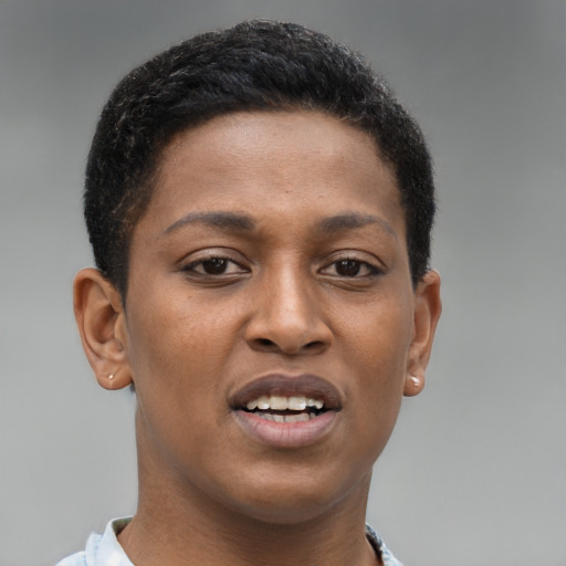 Joyful black young-adult female with short  brown hair and brown eyes
