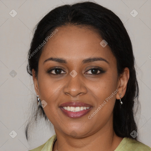 Joyful black young-adult female with medium  brown hair and brown eyes