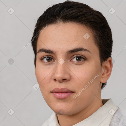 Joyful white young-adult female with short  brown hair and brown eyes