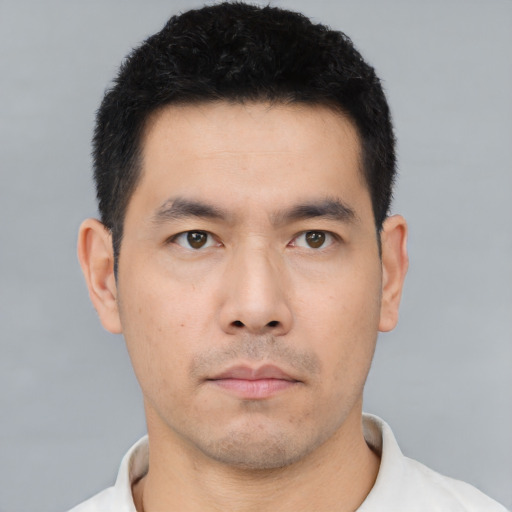 Neutral asian young-adult male with short  black hair and brown eyes