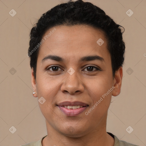 Joyful latino young-adult female with short  black hair and brown eyes