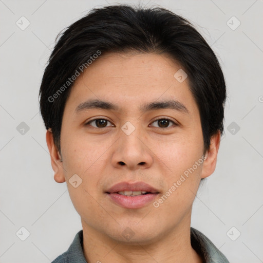 Joyful asian young-adult male with short  brown hair and brown eyes