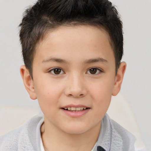 Joyful white child female with short  brown hair and brown eyes