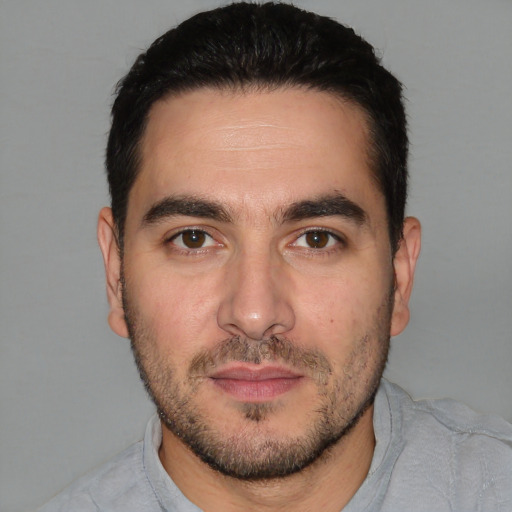 Neutral white young-adult male with short  black hair and brown eyes