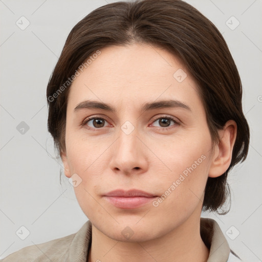 Neutral white young-adult female with medium  brown hair and brown eyes