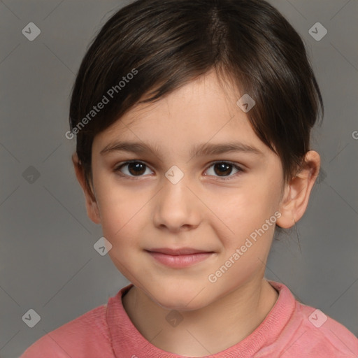 Joyful white child female with short  brown hair and brown eyes