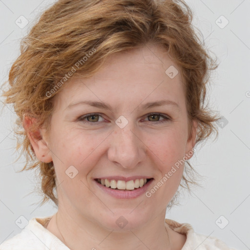 Joyful white young-adult female with medium  brown hair and blue eyes