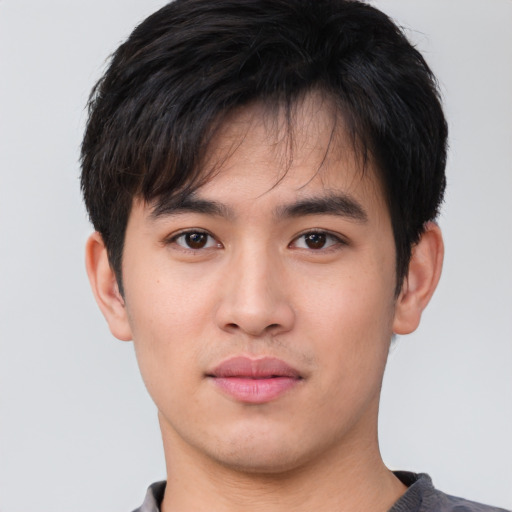 Neutral asian young-adult male with short  brown hair and brown eyes