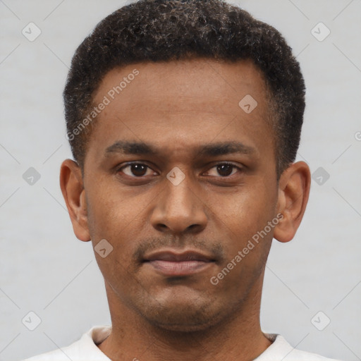 Neutral latino young-adult male with short  brown hair and brown eyes