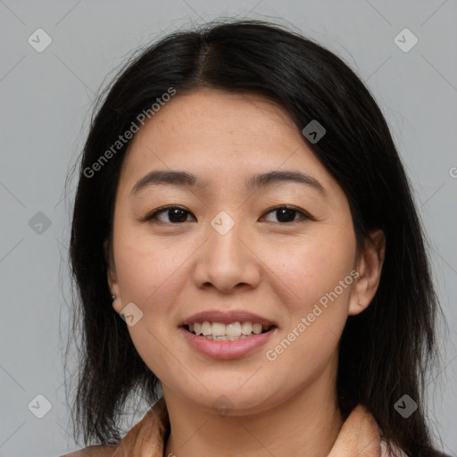 Joyful asian young-adult female with medium  brown hair and brown eyes