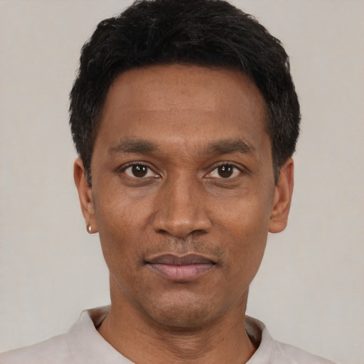 Neutral black young-adult male with short  black hair and brown eyes