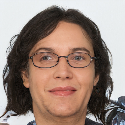 Joyful white adult male with medium  brown hair and brown eyes