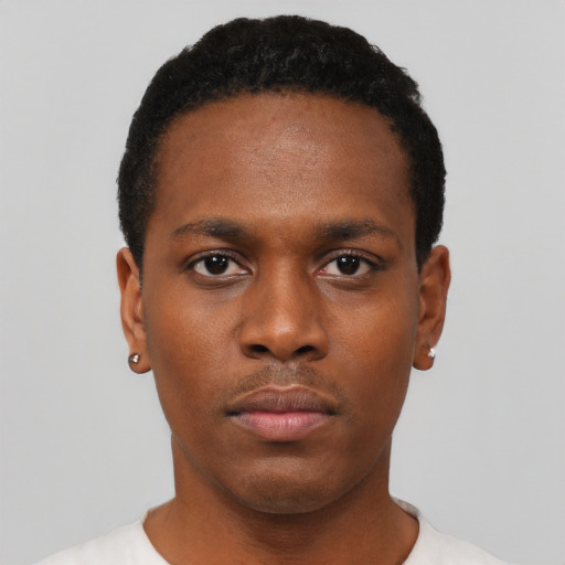 Neutral black young-adult male with short  black hair and brown eyes