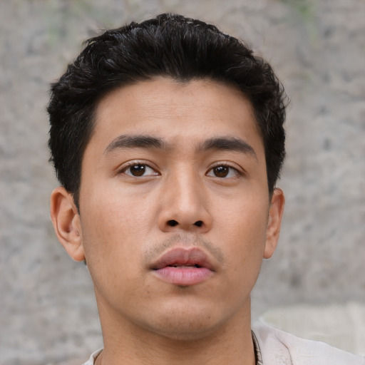Neutral asian young-adult male with short  black hair and brown eyes