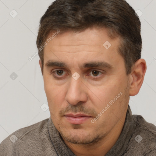 Neutral white adult male with short  brown hair and brown eyes