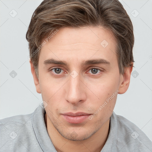 Neutral white young-adult male with short  brown hair and grey eyes