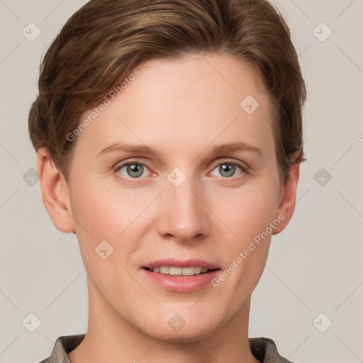 Joyful white young-adult female with short  brown hair and grey eyes