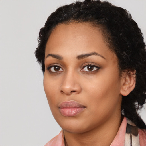 Neutral latino young-adult female with short  black hair and brown eyes