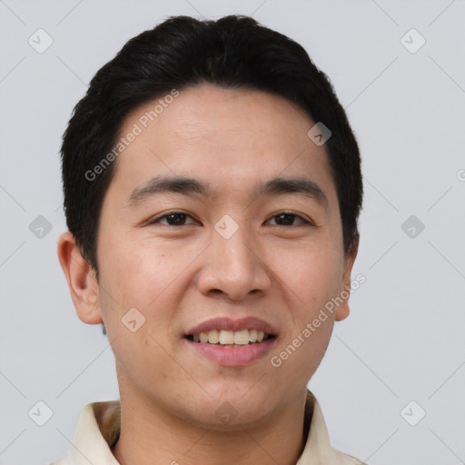 Joyful asian young-adult male with short  black hair and brown eyes