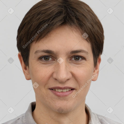 Joyful white adult female with short  brown hair and grey eyes