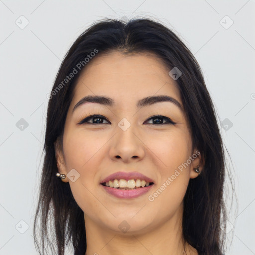 Joyful asian young-adult female with long  brown hair and brown eyes