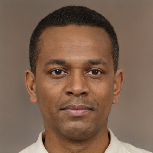 Neutral latino young-adult male with short  brown hair and brown eyes