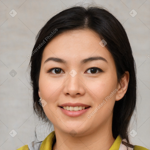 Joyful white young-adult female with medium  brown hair and brown eyes