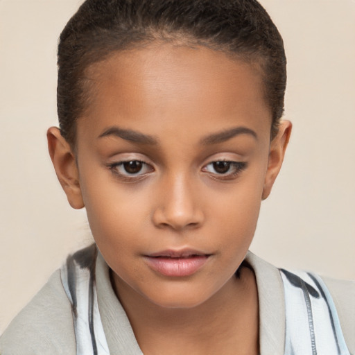 Joyful white child female with short  brown hair and brown eyes