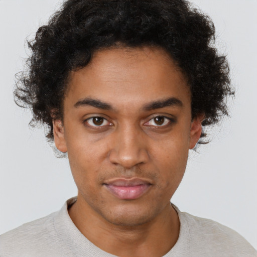 Neutral black young-adult male with short  brown hair and brown eyes