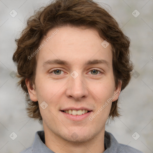 Joyful white adult male with short  brown hair and grey eyes