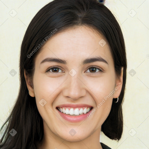 Joyful white young-adult female with long  brown hair and brown eyes