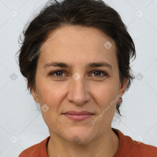 Joyful white adult female with short  brown hair and brown eyes