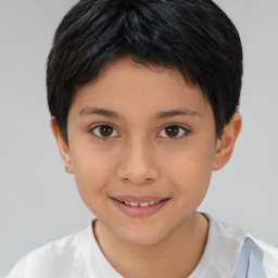 Joyful white child female with short  brown hair and brown eyes