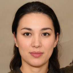 Joyful white young-adult female with medium  brown hair and brown eyes