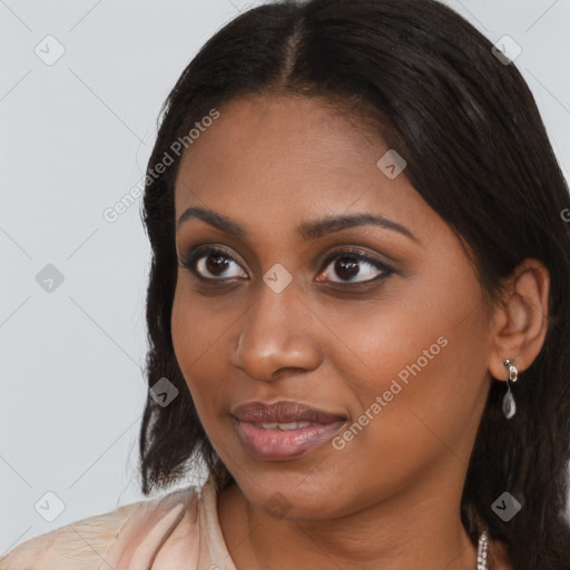 Neutral black young-adult female with long  brown hair and brown eyes