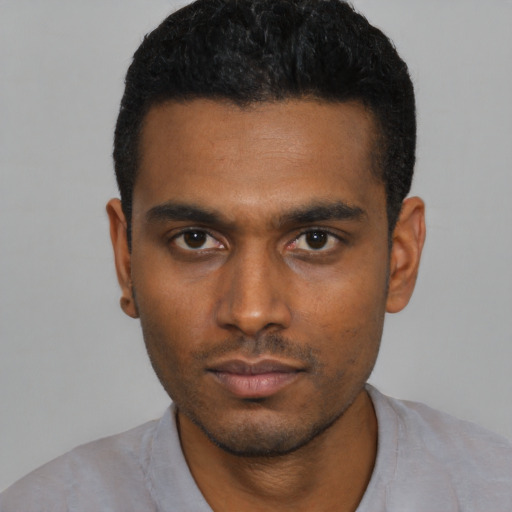 Neutral black young-adult male with short  black hair and brown eyes