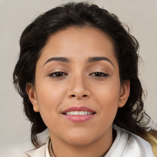 Joyful asian young-adult female with medium  brown hair and brown eyes