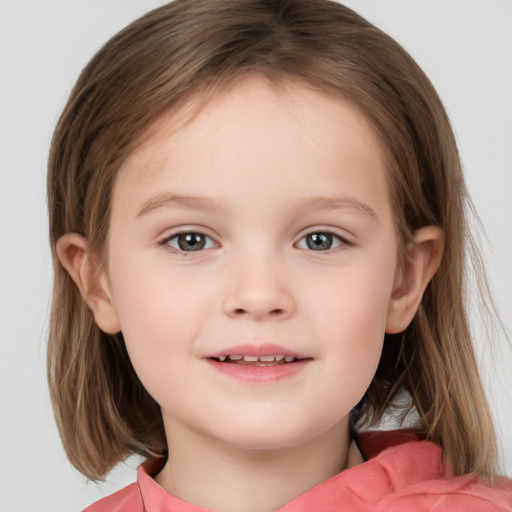 Joyful white child female with medium  brown hair and brown eyes