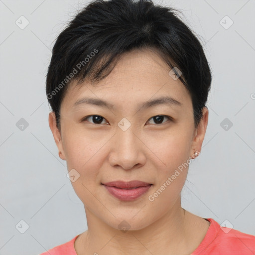 Joyful asian young-adult female with short  brown hair and brown eyes