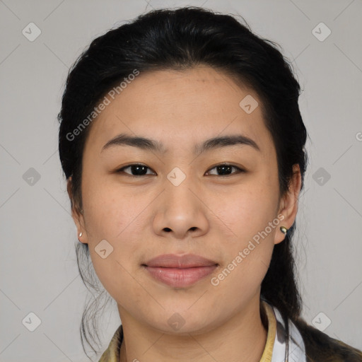 Joyful asian young-adult female with medium  black hair and brown eyes