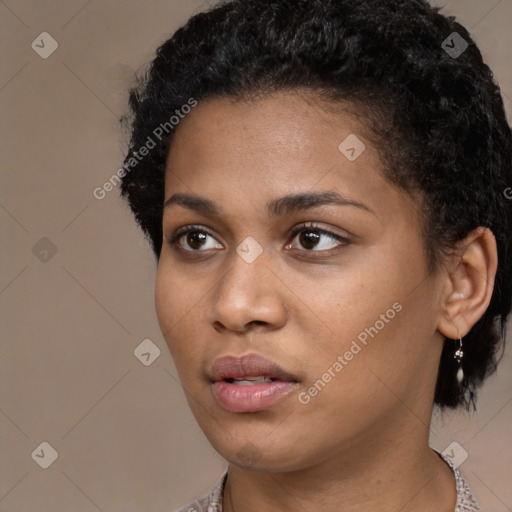 Neutral black young-adult female with short  black hair and brown eyes