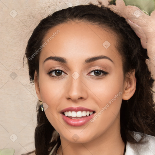 Joyful white young-adult female with long  black hair and brown eyes