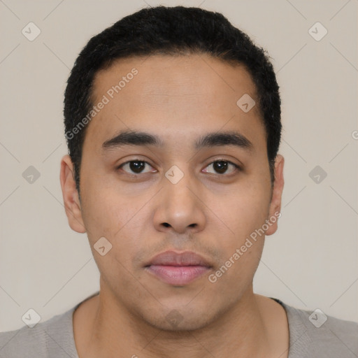 Neutral latino young-adult male with short  black hair and brown eyes